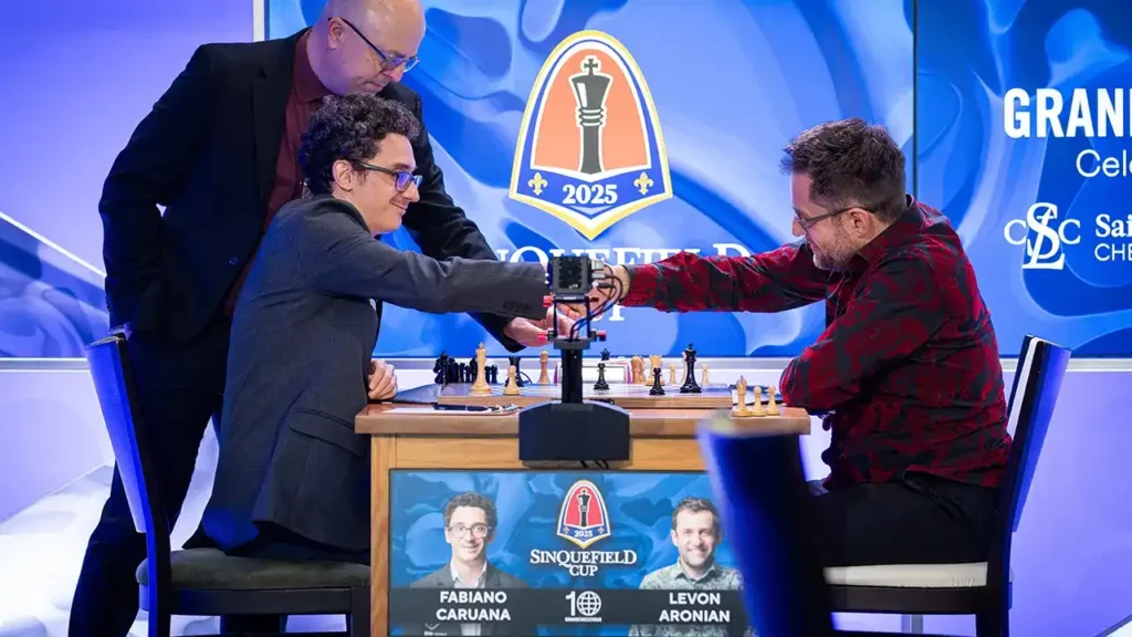 photo - 2025 Sinquefield Cup - Day 7 - GM Fabiano Caruana plays GM Levon Aronian with chess arbiter Chris Bird watching - LOS01716
